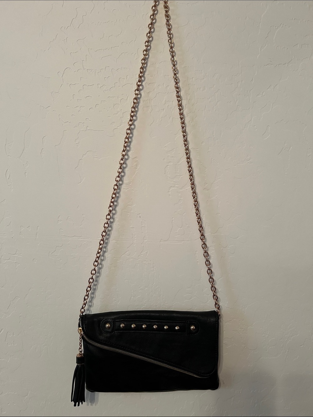 ALDO Black Chain-Strap Crossbody Bag with Tassel.